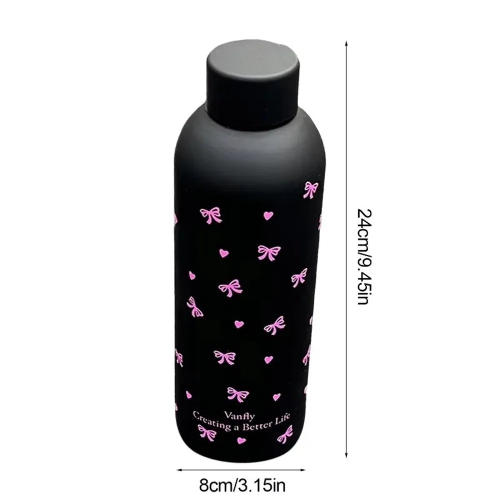 Taza térmica de acero inoxidable doble pared color negro con tapa negra y diseños de mariposa rosa