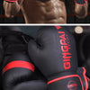 A pair of black boxing training gloves with red accents shown in a close-up view.