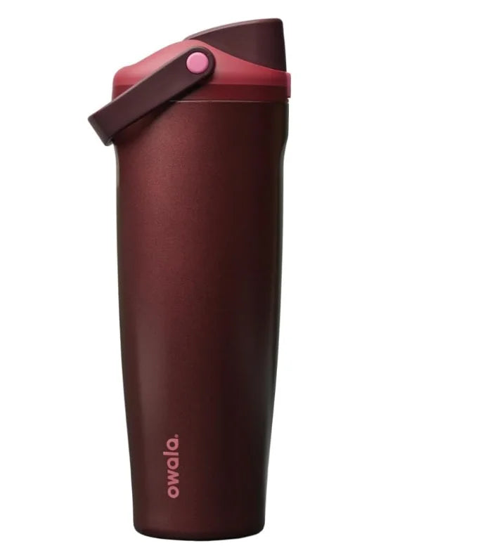 A dark reddish-brown insulated stainless steel travel mug with a pink lid.