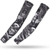 A pair of black and white graphic sports arm sleeves featuring skulls and wings for UV protection.