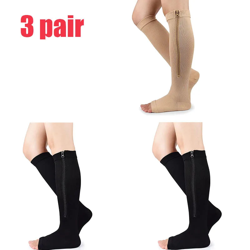 Three pairs of beige compression zippered stockings shown on legs.