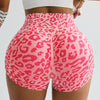 Pink leopard print high-waist seamless shorts worn by a model.