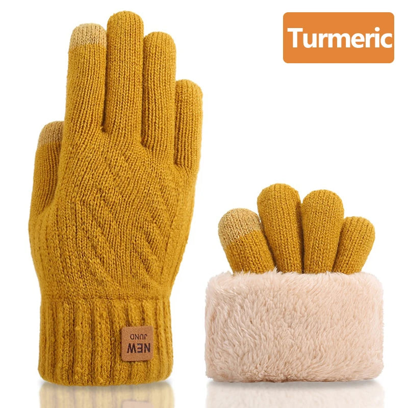 A pair of mustard yellow knit gloves with a light pink faux fur cuff.