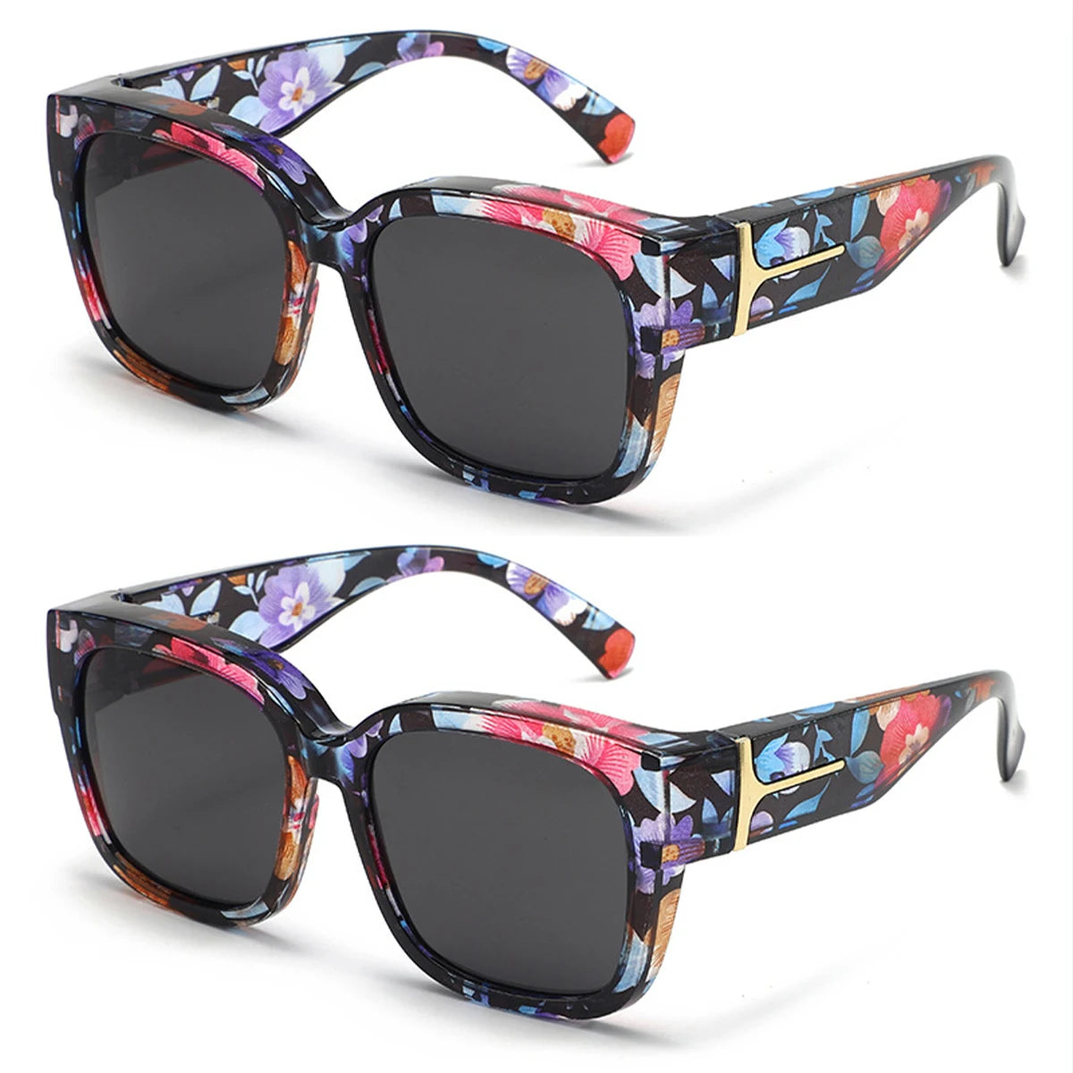 A pair of oversized polarized sunglasses with a dark frame featuring a floral pattern and gold accents.