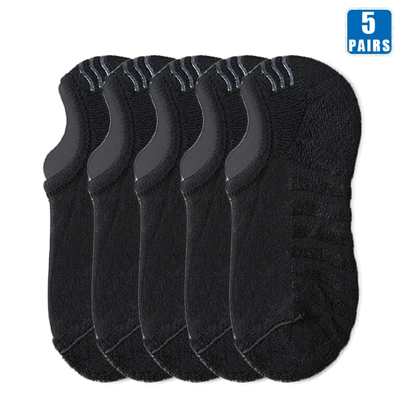 Five pairs of black men's cotton crew socks displayed together.