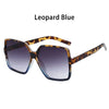 Pair of Leopard Blue vintage oversized retro sunglasses with brown patterned frames