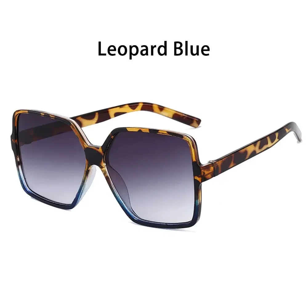 Pair of Leopard Blue vintage oversized retro sunglasses with brown patterned frames