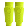 A pair of bright lime green lightweight soccer shin guards for calf protection.