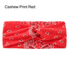 Diadema de tela roja con estampado paisley.
