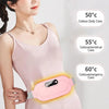A woman is shown using a portable pink menstrual heating pad on her abdomen, with temperature settings displayed.