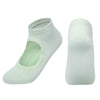 A pair of white breathable women's pilates and yoga socks shown from the side.