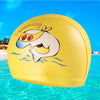 A yellow waterproof cartoon swimming cap featuring a smiling dolphin design against a bright blue water background.