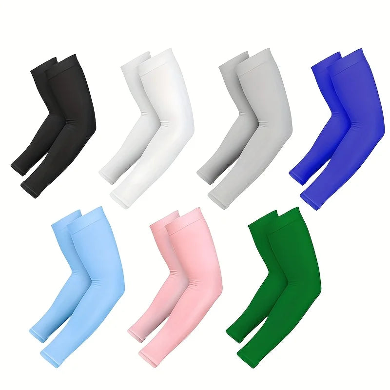 Colección de mangas largas en negro, blanco, gris y azul, mostradas desde varios ángulos.