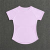 A light pink seamless high-waist yoga top for women shown against a dark gray background.