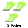 Three pairs of neon yellow compression sports socks shown from the top view.