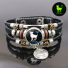 Pulsera de cuero negro con colgante de plata que presenta el símbolo zodiacal de Aries y diseño de constelación.