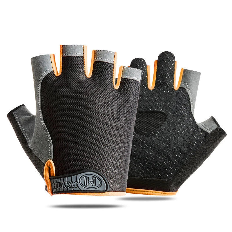 A pair of black gym workout gloves with orange accents shown from above.