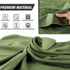 A close-up view of a smooth, olive green microfiber fabric being folded and draped.