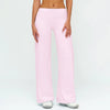 A woman is modeling light pink high-waist flared yoga pants.
