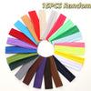 A collection of 15 random colored stretchable cotton sweat absorbing headbands.