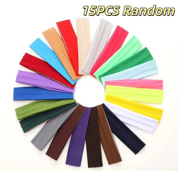 A collection of 15 random colored stretchable cotton sweat absorbing headbands.