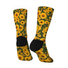 A pair of breathable crew socks with a vibrant yellow and green sunflower print.