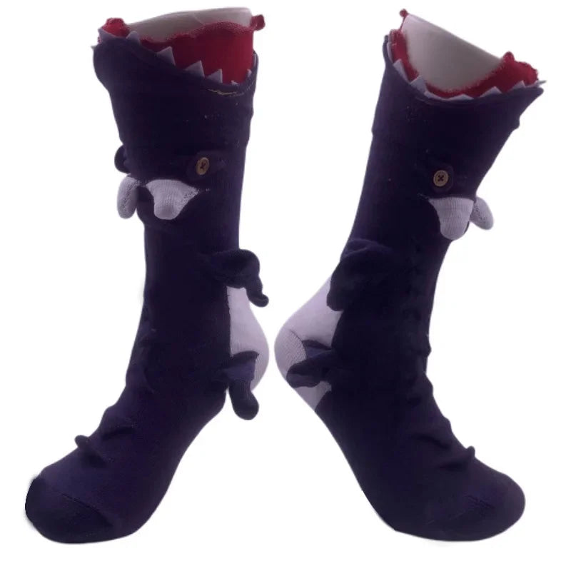 Pair of dark navy knit socks featuring a crocodile design for holiday parties