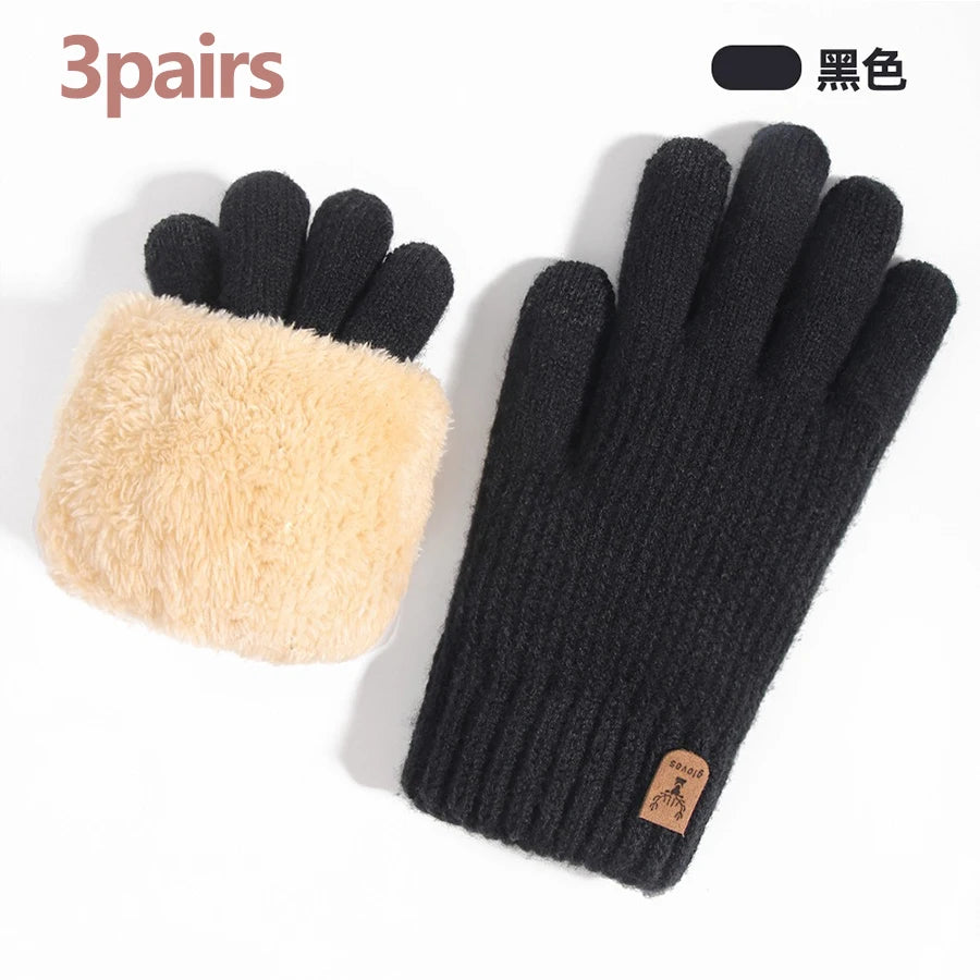 Three pairs of black knit gloves, including one pair with a light beige faux fur cuff.
