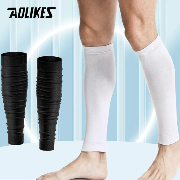 Un pantalon de compression blanc porté sur les jambes d'une personne.