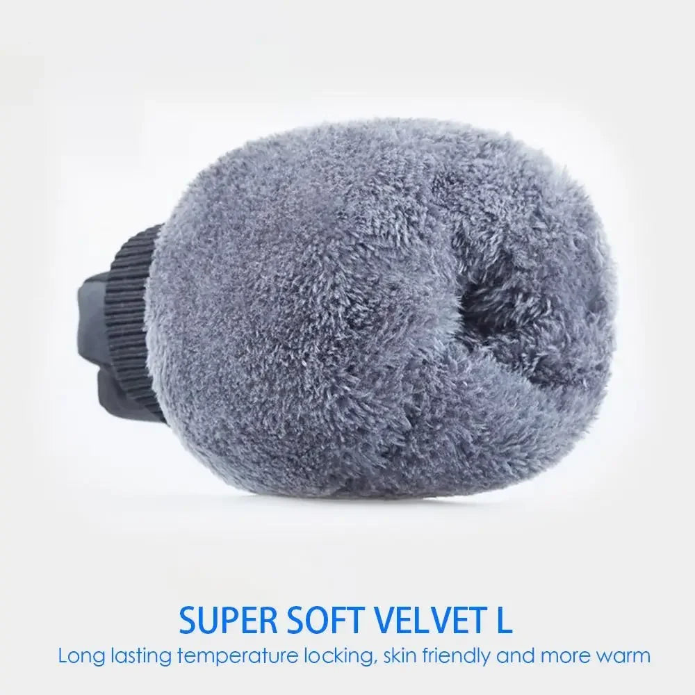 A close-up of a gray velvet pom-pom or ball used as a product for winter sports gloves.