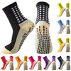 A variety of performance sports grip socks in black, yellow, and blue patterns shown from various angles.