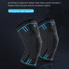 A pair of black elastic sports knee pads or compression sleeves shown against a dark background.