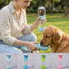 A woman feeds a dog using a 3-in-1 portable pet water and food dispenser with various colored bottles.