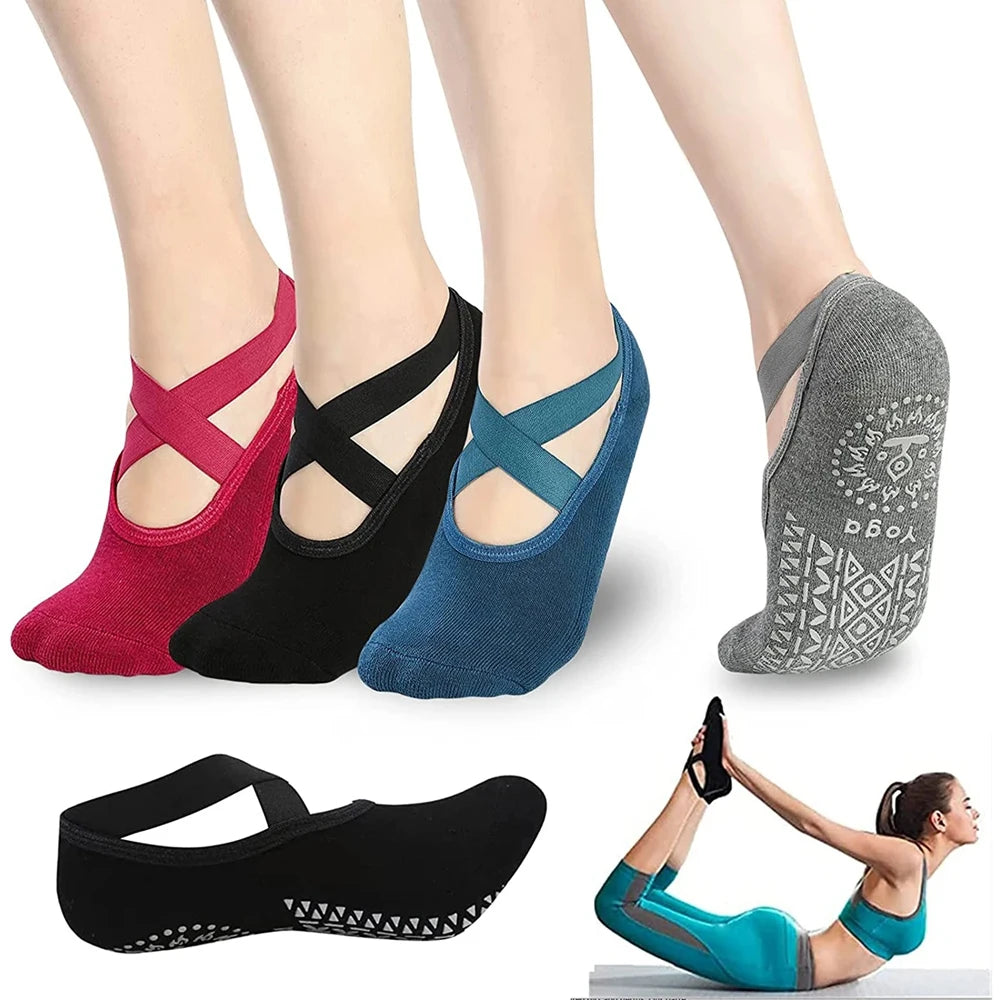 A set of breathable silicone yoga and pilates socks in various colors including red, black, blue, and gray.