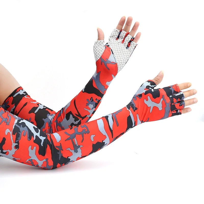 A hand wearing camouflage patterned arm sleeves and wrist protection.