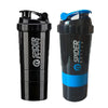 A black protein shaker bottle with a blue cap and a pill tray is shown standing upright.