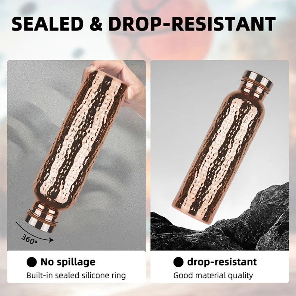 Insulated copper water bottle with anti-slip grip showing a close-up of the textured surface and sealed design.