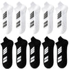 Un pack de dix chaussettes de sport blanches et noires, de divers styles et couleurs.