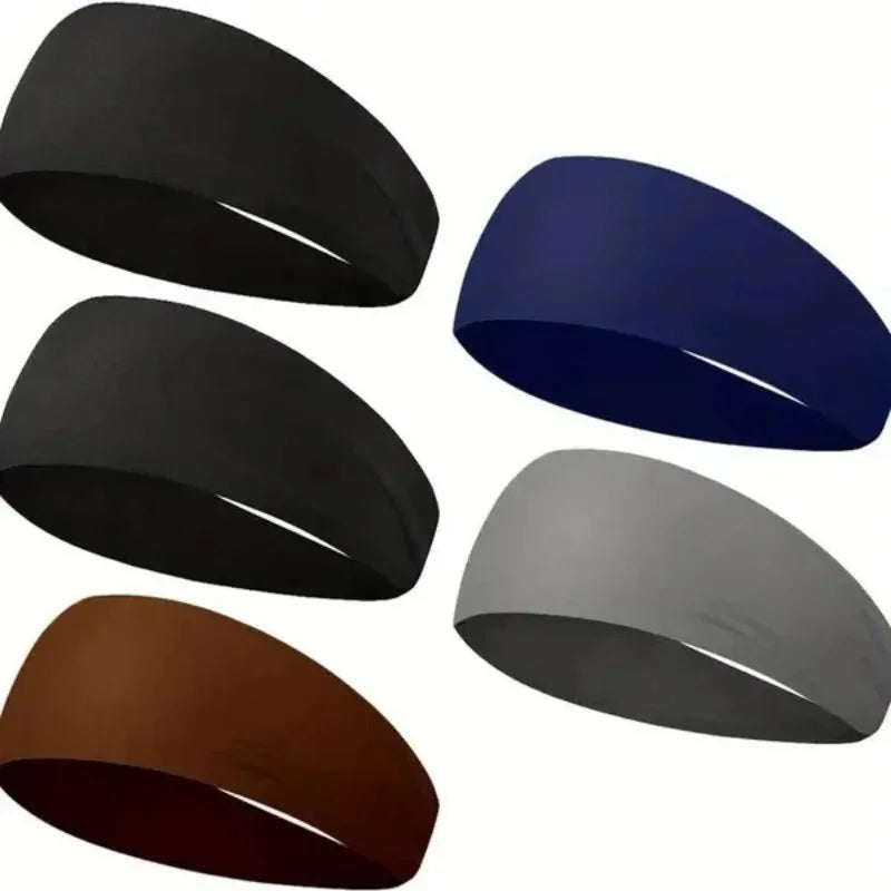 Una colección de cinco bandas para la cabeza deportivas de silicona en colores negro, azul oscuro, gris y marrón.