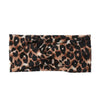 A black and brown leopard print wide headband for yoga and running.