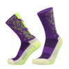 Purple and neon yellow patterned anti-slip silicone football socks shown from the side.