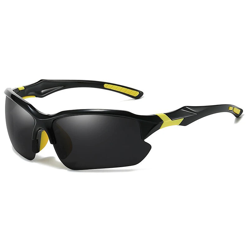 Black sunglasses with yellow accents shown against a white background.