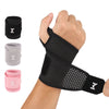 Black, gray, and pink adjustable wrist support braces shown on a hand for fitness