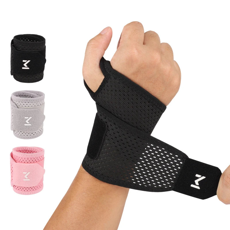 Black, gray, and pink adjustable wrist support braces shown on a hand for fitness