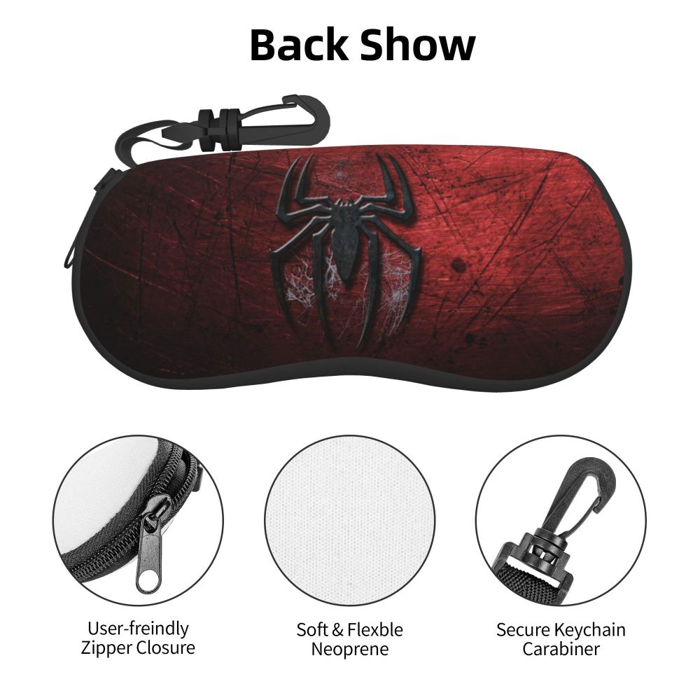 A black neoprene back show pouch featuring a silver spider web design and a keychain carabiner.