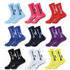 A collection of anti-slip silicone grip football socks in various colors including blue, pink, red, and purple.