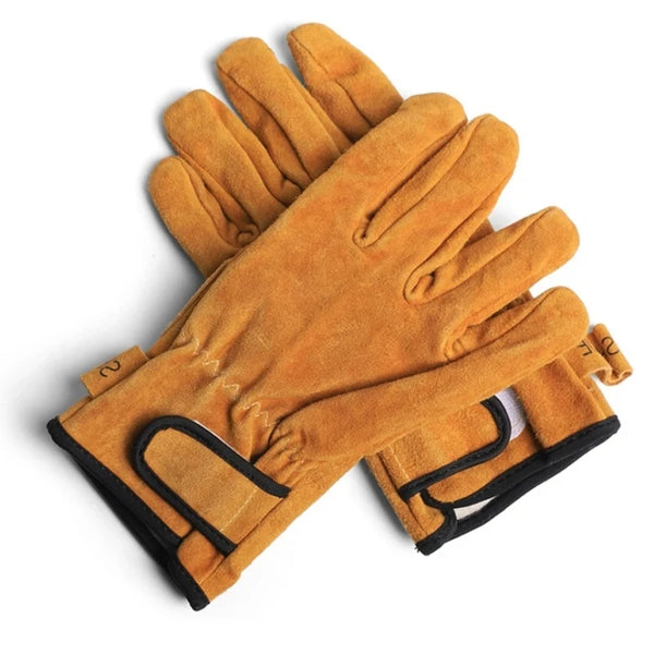A pair of tan heavy duty cowhide leather welding and work gloves shown from above.