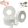 Rolls of white athletic finger tape and a hand demonstrating its use.
