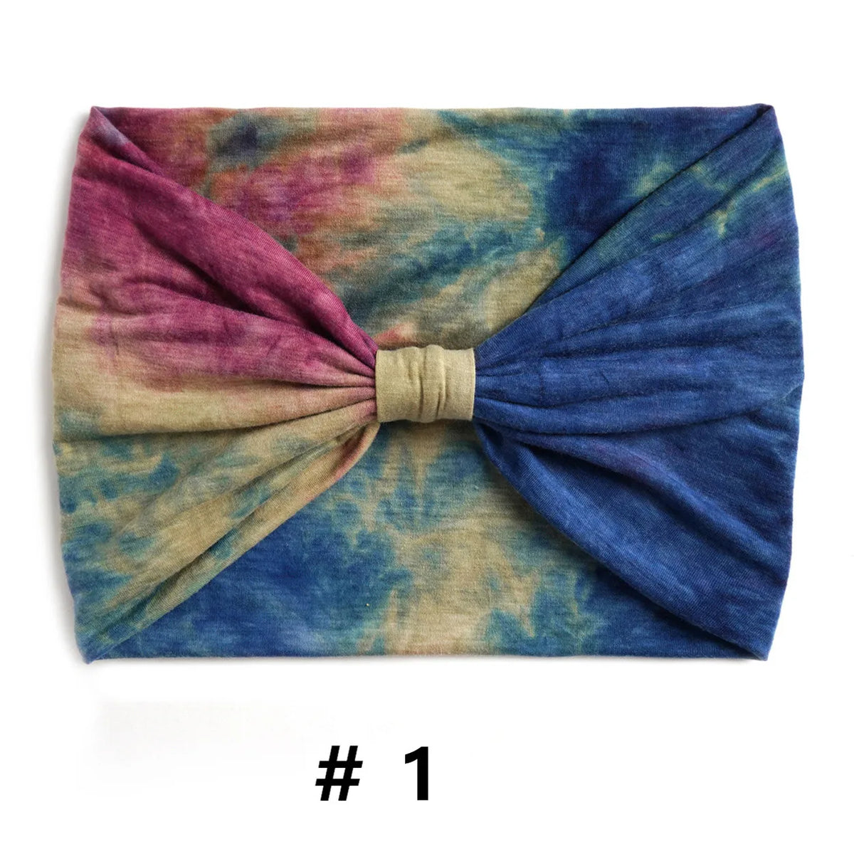 Bandeau en coton tie-dye violet, bleu et beige avec un nœud.