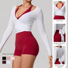 A woman models a white long sleeve top and red shorts, showcasing various color options and a tie-front design.